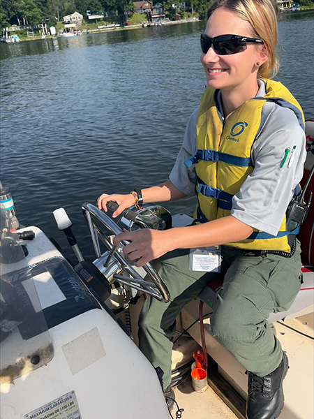 Hyde on a boat working as a park ranger